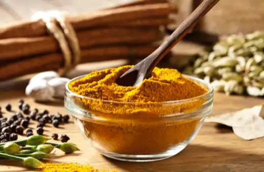 the image contains a bowl of curry powder, which is a famous alternative for fenugreek.