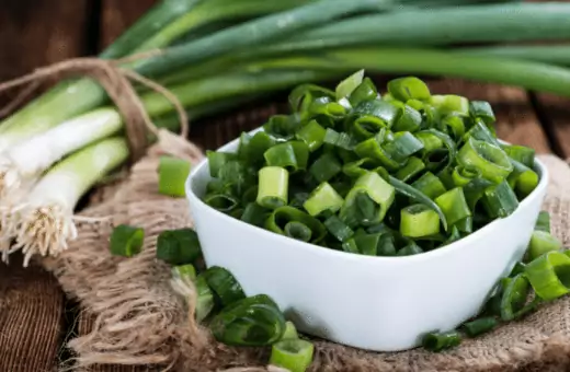 scallion is a perfect substitute for pearl onion.