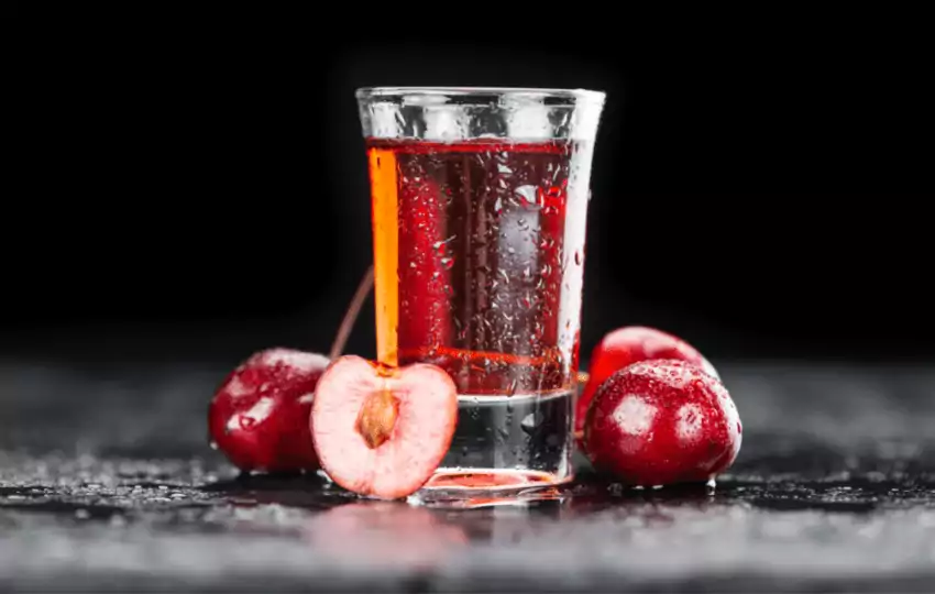 cherry liqueur is a type of alcoholic beverage that is made with cherries and typically has a sweet syrupy taste