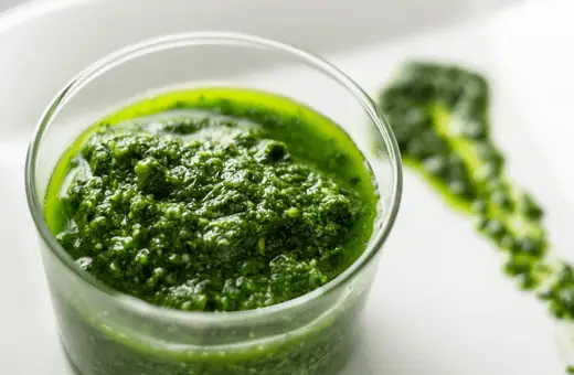 vegan pesto sauce is a great cheese substitute for pizza
