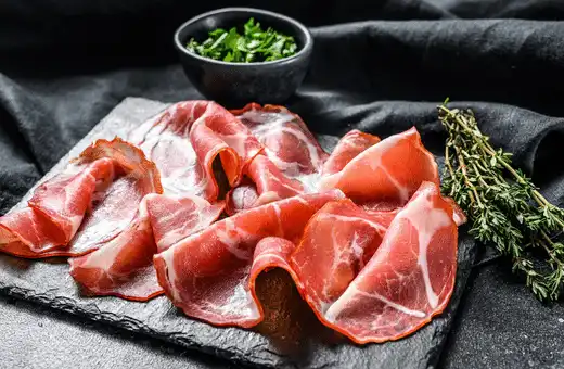 Capocollo is a dry cured pork shoulder. It is equal to prosciutto but has a more intense flavor and aroma. 