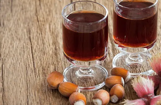 Hazelnut liqueur, like hazelnut ganache, can be a great substitution for Praline because it offers the same nutty flavor profile but with a twist of boozy flavor. 